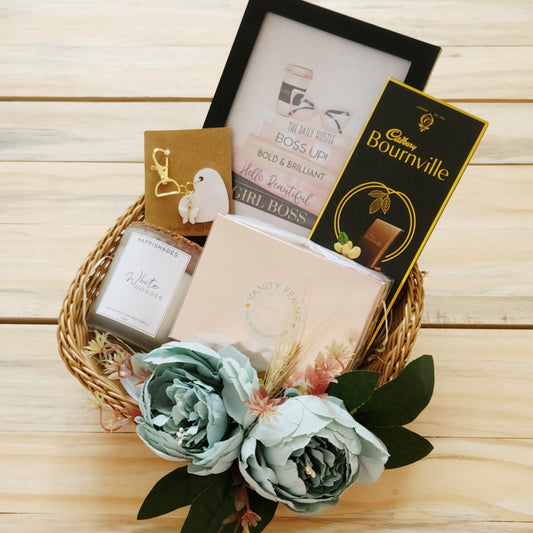 Women's day gift Hamper containing Perfume, Chocolate, Handbag charm, Photo Frame, Scented Frosted Jar Candle